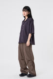 Out string glossy banding pants