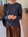 Clintel Layered Over Long-Sleeved T-Shirt
