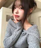 Kishi Ribbed Slit Off-Shoulder Knit