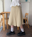 Nekomi Pleated Midi Skirt