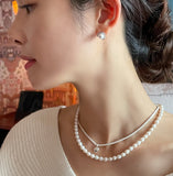 Koir Pearl Cubic earrings