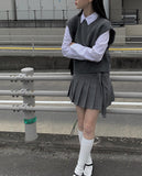 Dachi belted mini pleated skirt