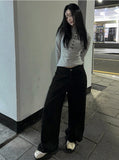Two-button strap wide pants