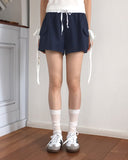 Raffen Banding Color Matching Ribbon Pocket Shorts