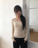 Burin Punched Wavy V-Neck Knit