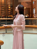 Kiet V-neck pendant knit cardigan