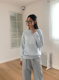 Butter roll lettering overfit crop long sleeve knit