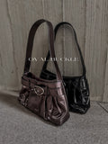 Oval buckle shoulder bag