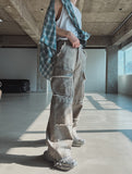 Mud damage denim cargo pants