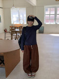 Clintel Layered Over Long-Sleeved T-Shirt