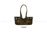 EYELET BELTED STRAP BAG
