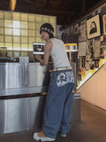 Cartel back painting balloon denim pants