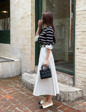 Tyne Cotton Two-Button Flare Long Skirt