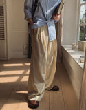 Porori three-tuck back banding slacks