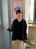Cotina V-neck Slit Cable Knit