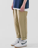 Deep tuck loose fit tapered banding pants