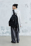 EYELET THREE-POCKET BUCKLE BACKPACK