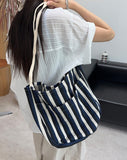Penan striped shoulder bag
