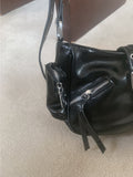 Gate eyelet buckle shoulder bag