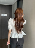 Betty V-neck Embossed Wrinkle Peplum Blouse