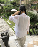Any loose fit gauze see-through shirt
