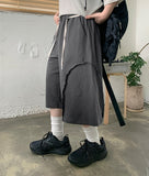Neraki Incised Strap Bermuda Sweatpants