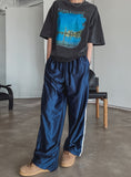 Glossy foil track pants
