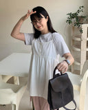 Hohoi button pintuck sleeveless blouse