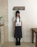 Nuen Pleated Midi Skirt