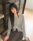 Nilla cut-out round neck button long-sleeved cardigan