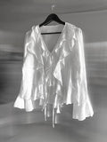 Plumel Ruffle V-Neck Blouse