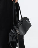 Dangling buckle shoulder bag