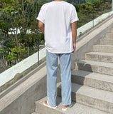 Half-bending semi-wide denim pants