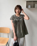 Hustle check ribbon short sleeve blouse