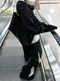 Oblique side zipper nylon pants