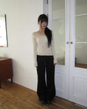 Burin Punched Wavy V-Neck Knit