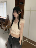 Illum Embroidery Punching Slit Cropped Short Sleeve Blouse