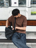 Cable knit short sleeve henry neck ver
