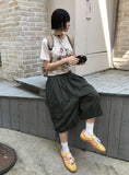DIAGONAL POCKET BERMUDA PANTS