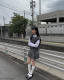 Dachi belted mini pleated skirt