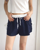 Raffen Banding Color Matching Ribbon Pocket Shorts