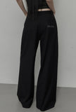 [mnem] Folded Emblem Slacks