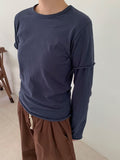 Clintel Layered Over Long-Sleeved T-Shirt