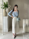 Pompon jacquard H-line banding skirt