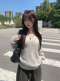 Picker V-neck Loose Cable Knit