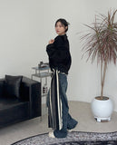 Pad snap button denim pants