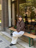 Kindrun Stitch Over Windbreaker