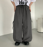 [BAONHAUS] Nylon Cargo Ribbon Bending Pants