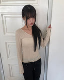 Burin Punched Wavy V-Neck Knit