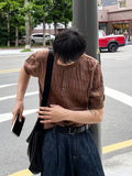 Cable knit short sleeve henry neck ver